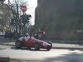 ferrari f1 in rome around colosseum