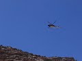 Helicopter flying through Temple Wash, Utah