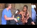 Medical volunteers try to help a young boy who has eye cancer in Sierra Leone, Africa - BBC