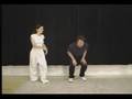 Selfdefence teacher kicking male
