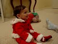 Laughing Baby in Santa Suit