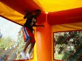 Fliping in a moon bounce