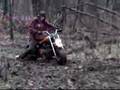 baja mini bike offroading in the woods