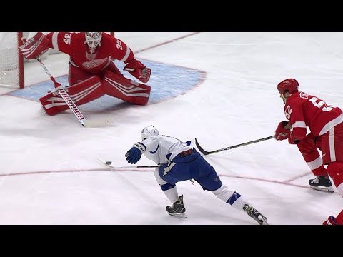 Mathieu Joseph hustles to push a puck home