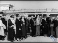 A raucous group of senior citizens swap London for the Essex coast. This charming silent film charts a pre-war day trip to Southend-on-Sea, taken by a group of London pensioners who gather outside the Broadway Cinema, Walham Green. Book-ended by a cavalcade of buses taking the happy tourists to and from their destination, this film is filled with a bawdy knees-up spirit. It's all there, from ice creams and sticks of rock to people dancing on the promenade, dressed to the nines, high on life, the sea air and possibly a beer or three. This riotous time capsule is over all too soon and you get the feeling that the holiday was too. (Amanda Boxford) You can see over 2000 other titles from the BFI National Archive free in BFI Mediatheques around the UK - www.bfi.org.uk