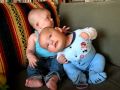 Baby Cousins side by side - sitting together Baby Cousins side by side - sitting together
