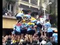 One of the traditional ways to celebrate Krishna Janmashtami in Mumbai is for gangs of revellers to form human pyramids reaching upto 8, 9 or even 10 layers high to reach for a pot of curd (Dahi Handi) hung high above the street. While it's mostly men who form the tall pyramids, women actively participate too. Here's a group of women trying their luck at a Dahi Handi in Dadar, Mumbai.