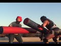contestants battle wolf in joust to win hannah montana tickets.
