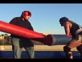 contestants battle wolf in joust to win hannah montana tickets.