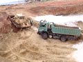 truck stuck in mud , greece / constructing golf course truck stuck in mud , greece / constructing golf course