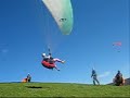 Paraglier launch in strong wind with twisted risers(on slow)