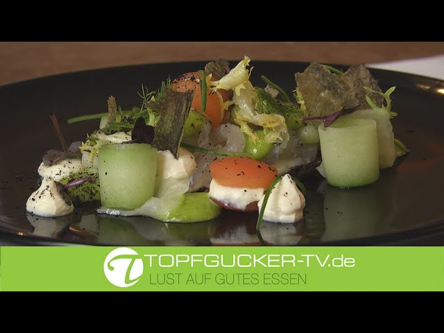 Gebeizter Kabeljau auf warmem Pumpernickel und grüner Mayonnaise