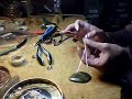 www.magpiegemstones.com In this video I describe how to bundle round wires for a border wrap. A border wrap is a techbnique in wire wrapped jewelry to capture a cabochon. Usually square wire is used but I like the look of the design elements I can create with round wire and it sometimes can be unruly in this application. Come visit on Facebook to play with us http and sign up for our newsletter to be informed when new articles, free tutorials, and specials come onto the website. Everyone who signs up for the newsletter is autromatically enrolled into the $200 shopping spree we give away once a year. www.magpiegemstones.com