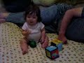 Hadley sits up by herself and plays with Daddy