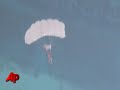 Two sky divers leaped off the tallest building in the world Friday setting a new record for the highest ever base jump from a man made structure. The building in Dubai measures 2020 feet tall. (Jan. 8)