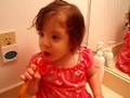 Emma brushing her teeth
