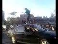 dancing ontop of a car