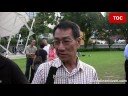 Angry Investors Flood Speaker\