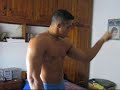 Muscle man flexing muscles posing on webcam
