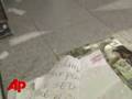 Bank Gunmen Escape in Ambulance
