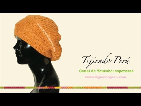 Boina caida con trenza en el borde tejida en dos agujas