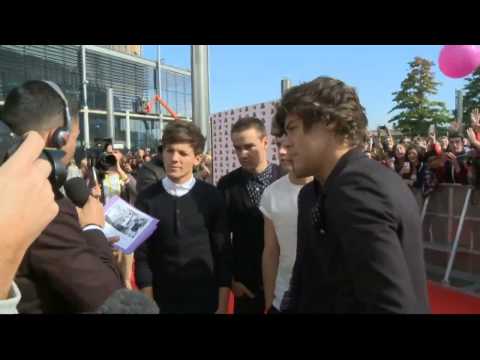 One Direction get the giggles during an interview Video