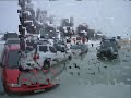 cars sinking  in to Lake Simcoe