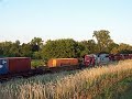 CP 182 stack train passes CP 185 auto train at Weaver