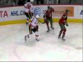 2010-05-12 | Langkow hit in the back of the neck ~> Daymond Langkow was hit in the back of his neck with the puck and taken off by a stretcher. ()