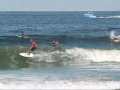 We catch our friend Rich and a few other surfers catching big sloppy waves on the Jersey Shore.