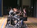 Amazing 9yr old drummer with mosh pit groupies.