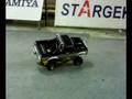 videos de Tamiya Toyota Hilux Climbing over RC Silvia