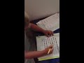 Down syndrome:&nbsp;down Syndrome Emir reading ''The Dog and the Girl''