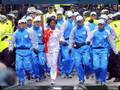 Olympic Torch who are the Men in Blue? BBC reports