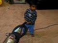 Mintu Playing with Vaccum Cleaner on Jan 24th 2007.
