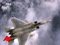 Military: One pilot dead after F15s crash