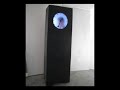Designer Maarten Baas presents REAL TIME in Milan. Among other designs for clocks, there will be a grandfather clock with a built-in screen. This screen shows a 12-hour loop, of someone drawing the hands of a clock in real time. www.maartenbaas.com