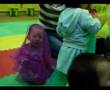 Baby Natalie playing with scarves