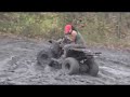 Girls Mudding on 4 wheelers, little wrestling also!