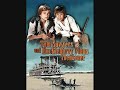 tom sawyers und huckleberry finns abenteuer
(deutschland/frankreich 1968)
themenmusik von vladimir cosma

fernsehlexikon:
4-tlg. dt.-frz. abenteuerfilm von walter ulbrich nach dem roman von mark twain, regie: wolfgang liebeneiner.
die jungen tom sawyer (roland demongeot) und huckleberry finn (marc di napoli) sind beste freunde. tom lebt zusammen mit seinem bruder sid (robert hecker) bei seiner tante polly (lina carstens). huck lebt in einem fass, sein vater (marcel peres) ist ein s�ufer. gemeinsam erleben tom und huck viele abenteuer. sie befreien den unschuldig einsitzenden muff potter (otto ambros) aus dem gef�ngnis und entlarven indianer-joe (jacques bilodeau) als m�rder. sie finden den schatz von indianer-joe und werden reich. tom ist in becky thatcher (lucia ocrain) verliebt, die tochter des richters (roland armontel). huck wird von der witwe douglas (marcela russu) adoptiert und zieht bei ihr ein. er fl�chtet jedoch gemeinsam mit ihrem sklaven jim (serge nubret), den er unterwegs kennen lernt, auf einem flo�. dadurch trennen sich die wege von huck und tom.
ernst fritz f�rbringer fungierte in allen vier teilen als erz�hler. die spielfilmlangen folgen liefen - jeweils sonntags um 20.00 uhr - mit so gro�em erfolg, dass sie nur ein jahr sp�ter wegen der hohen nachfrage bereits wiederholt wurden, was damals ungew�hnlich war.

besetzung:
roland demongeout
marc di napoli
otto ambros
roland armontel
jacques bilodeau
lina carstens
serge nubret
marcel perez
marcela russu

drehbuch: walter ulbrich
regie wolfgang liebeneiner