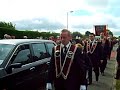 the first part of lower iveagh royal black district chapter on parade in saintfield at the county down black saturday parade, organised by the royal black institution. lower iveagh takes in the north west of county down, centring on the town of dromore. this clip includes maralin black watch rbp 100 with dollingstown star of the north flute band, star of clogher temperance rbp 139 with clogher flute band, bethlehem's golden star (dromore) rbp 169 with john hunter memorial accordian band from mountnorris, ballyvicknakelly rbp 283 with ballykeel accordian band, ballaney rising star rbp 1024, and skeogh rbp 1072 with skeogh flute band.