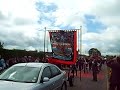 the first part of lower iveagh royal black district chapter on parade in saintfield at the county down black saturday parade, organised by the royal black institution. lower iveagh takes in the north west of county down, centring on the town of dromore. this clip includes maralin black watch rbp 100 with dollingstown star of the north flute band, star of clogher temperance rbp 139 with clogher flute band, bethlehem's golden star (dromore) rbp 169 with john hunter memorial accordian band from mountnorris, ballyvicknakelly rbp 283 with ballykeel accordian band, ballaney rising star rbp 1024, and skeogh rbp 1072 with skeogh flute band.