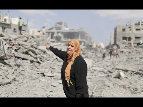 During cease-fire, Gaza residents survey destruction