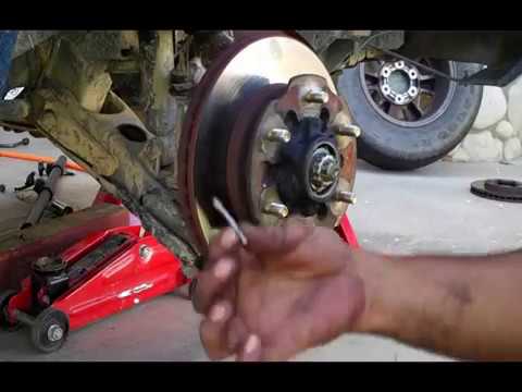 how to remove rotors from nissan frontier 2003.wmv