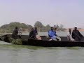 This video clip of a fully-loaded pinasse (boat) on the Bani River near Mopti, Mali was taken on 21 January 2008. The confluence of the Bani River and Niger River is located near Mopti. For information about Mopti, please refer to http://en.wikipedia.org/wiki/Mopti. For information about the Niger River, please refer to http://en.wikipedia.org/wiki/Niger_river. For information on the Bani River, please refer to http://en.wikipedia.org/wiki/Bani_River.