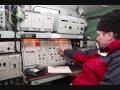A group of radio technicians help out...