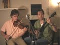 rehearsal in june, 2007.  jonny anderson on fiddle, tom collins on banjo and vocals.

www.newhottimes.com