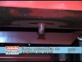 Carga automatica de bobinas de papel en un camion
