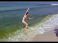skin boarding in the ocean