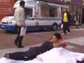 RED Bed  girl makes a bed on busy street